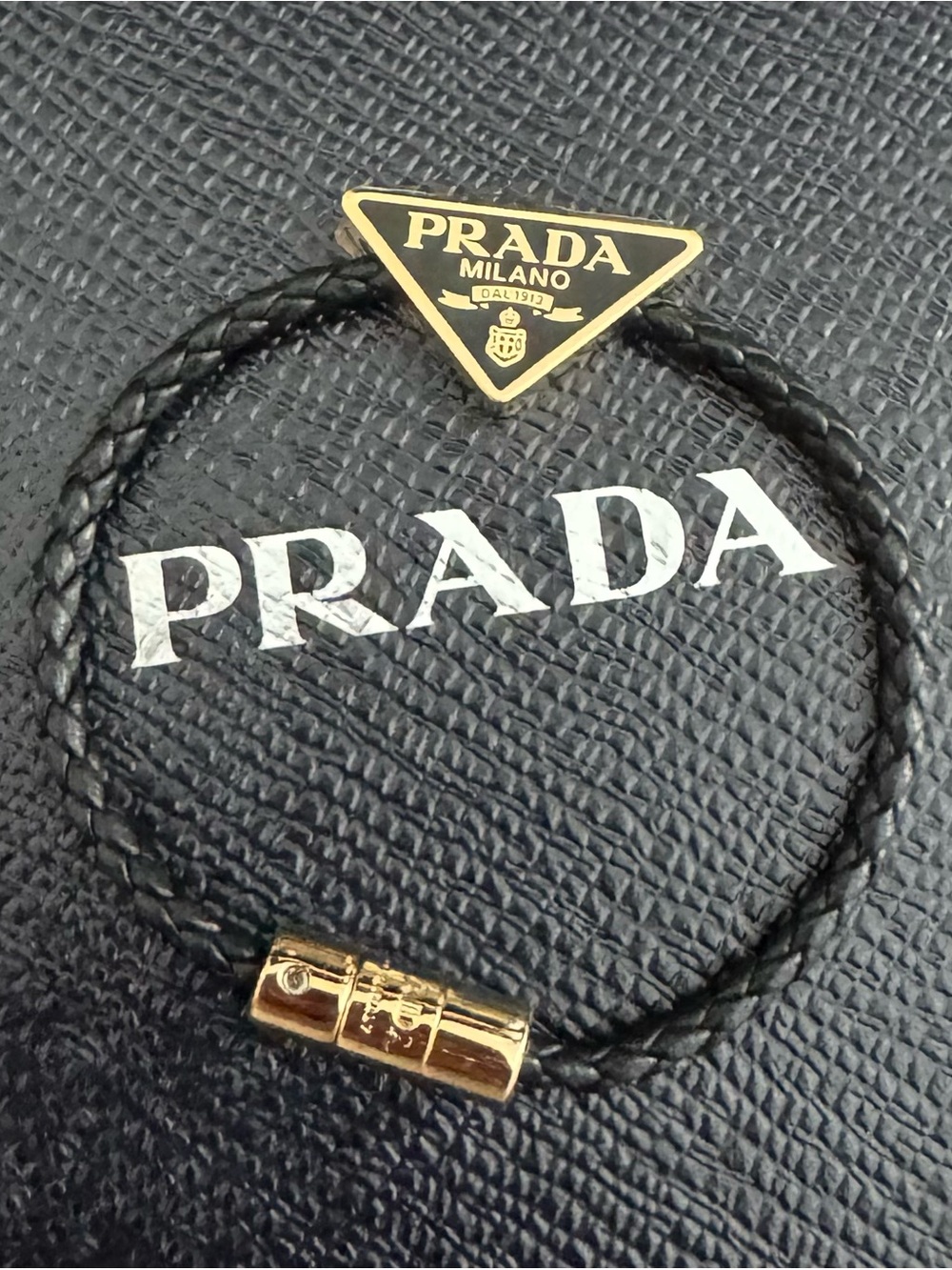 PRADA Nappa Leather Triangle Logo Bracelet in Black & Gold